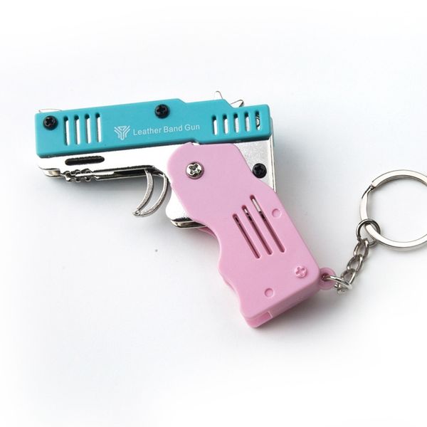 ABS ALLY Rubber Band Gun Toy Mini Keychain Sac pendentifs Hands Stress Relief Toys Pistol Toys Kid Outdoor Party Pliant Boyfriend Cadeaux 022