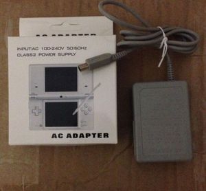 Cable adaptador de cargador de fuente de alimentación de pared para el hogar de CA con caja de venta al por menor para Nintendo DS NDS GBA SP