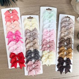 Accessoires 10 stks/Set Solid Color Kids Bows Hair Clips voor babymeisjes Handgemaakte lint Bowknot Hairspin Barrettes Nieuwjaars haaraccessoires