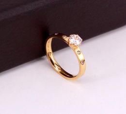 Accesorios Bandas Joyería de moda Joyería de amor Titanuim Acero Anillo de color oro rosa Anillo de cristal para mujeres Pareja Anillos de dedo Wed8444426