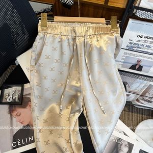 Ácido acético hielo seda pantalones de patas ancho verano 2024 nuevos pantalones delgados de ajuste delgado pantalones casuales