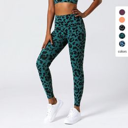 Pantalon actif Europe et Amérique imprimé léopard Sexy Yoga femmes taille haute serré hanche levage neuf points sport course à pied