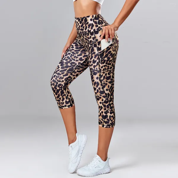 Pantalones activos Leggings de estampado de leopardo Capris Yoga de cintura alta para mujeres con bolsillos laterales gimnasio de secado rápido Terceras deportivas Fitness Clothing