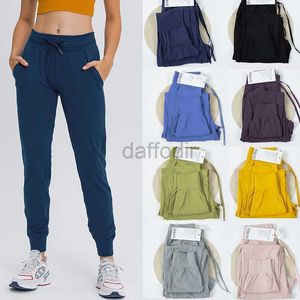 Pantalon actif Lu Yoga Dance Studio Coupe décontractée Jogger taille moyenne Pantalon de survêtement effilé doux sur toute la longueur Confort décontracté Cordon de serrage Gym City Sweat avec poches 240308