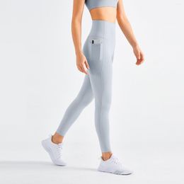 Actieve broek Sexy Sports Leggings Gym Yoga Fitness Mode Solid Color Dubbele zijzakken Anti-rollende naakt naadloze voet