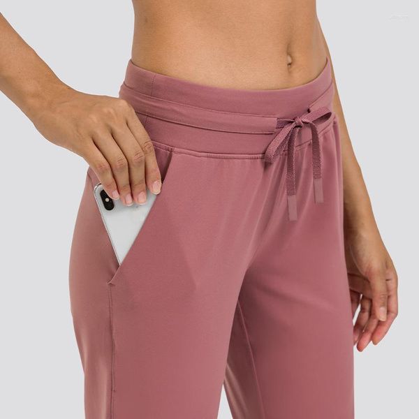 Pantalones activos Color sólido Suave para mujer Entrenamiento integral Pantalón deportivo Fintess Yoga Legging Cordón Pies Pantalón Bolsillo Fábrica personalizada