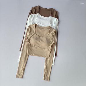 Chemises actives Nude col en V tasse intégrée coussin de poitrine costume de yoga haut T-shirt de sport haute élasticité Fitness manches longues vêtements à séchage rapide