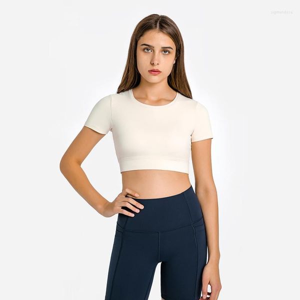 Chemises actives Couleur unie T-shirt de yoga Col rond Femme Manches courtes Nombril exposé Sport Respirant Crop Top Séchage rapide avec coussin de poitrine