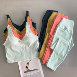 Camisas activas Camisetas Traje de yoga Lu Top + Pantalones Conjunto para mujer Chaleco deportivo Leggings para saltar Gimnasio Resistencia Entrenamiento de fuerza Ropa deportiva Ropa para correr