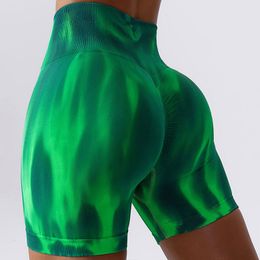 Shorts actifs Tie Dye Shorts de sport pour femmes Gym Sans couture Taille haute Amélioration de la hanche Pantalons de yoga sexy Vélo Push Leg Vêtements pour femmes 230710