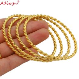 ADIXYN 4PCS / LOT Twisted Bangle Gold Color Dubai Bracelet Africain Arab Middle East Bijoux de mariage N071017 240424