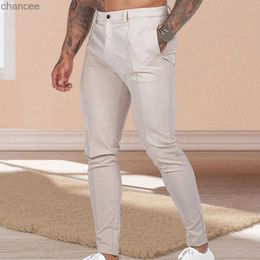 Men de taille réglable pantalon de couleur unie élégante pantalon commercial slim.