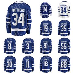 Maglie da hockey per adulti nuove arrivate # 34 AUSTON MATTHEWS # 16MITCHELL MARNER # 91 JOHN TAVARES # 88 WILLIAM NYLANDER # 11 MAX DOMI maglia da casa giocatore bianco nero BLU