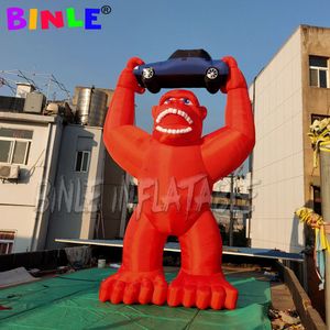 Carton publicitaire 8mh (26 pieds) avec ventilateur vert rouge violet gorille gonflable chimpanzé avec logo personnalisé de voiture imprimé pour promotion