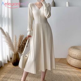 Aelegantmis Vintage Longue Robe Tricotée Femmes Solide Sexy Chaud Pull Plissé Robes Bouton Casual Lâche Vestidos Mujer Coréen 210607