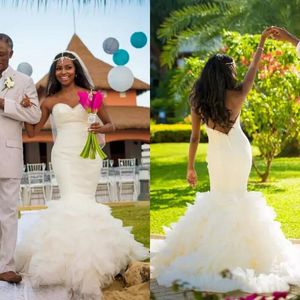 Vestidos de novia africanos de sirena de satén sin espalda con escote corazón 2018 con vestidos de novia largos con volantes hechos a medida de China EN12095