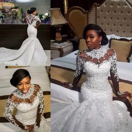 Robes de mariée de luxe africaines 2018 appliques de dentelle perles col haut robes de mariée pure manches longues sirène robes de mariée balayage train