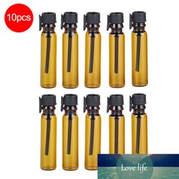 AIHOGARD 10 STKS 1ML Draagbare Hervulbare Lege Bruin Glas Parfumfles met Black Cap Trial Pack Tube Essential Oil Container