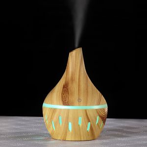Humidificateur d'air Diffuseur d'arômes de bois Aromathérapie Diffuseur d'huiles essentielles Ultrasonic Cool Fogger Humidifier avec 7 couleurs LED Light