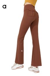 AL Pantalon de fusée de yoga respirant au printemps et à l'automne avec un pantalon de yoga de poche de travail à taille haute et à la hanche