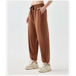 al Yoga Wear Femmes Neuvième Pantalon de jogging Prêt à tirer la corde Joggers Pantalon de sangle d'entraînement taille haute extensible 3 couleurs YK245 mode