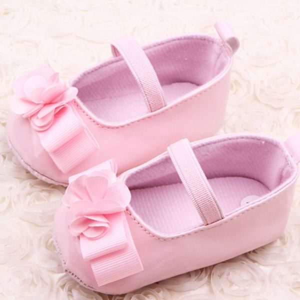 Venta al por mayor-Nueva niña infantil Flor de la cinta Zapatos de bebé Niño Suela suave PU Zapatos de cuna de cuero Envío gratis