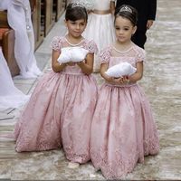 Dusty roze bescheiden bloem meisjes jurken voor bruiloften party cap mouwen kant applicaties vloer lange baljurk bloemgirl eerste communie jurk