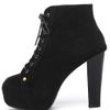 black ankle boots with tan heel