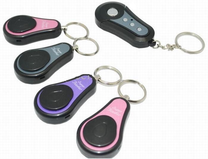 Alarme anti-perte 4 en 1 RF sans fil elec Finder Locator Key Chain + 1 émetteurs + 4 récepteurs