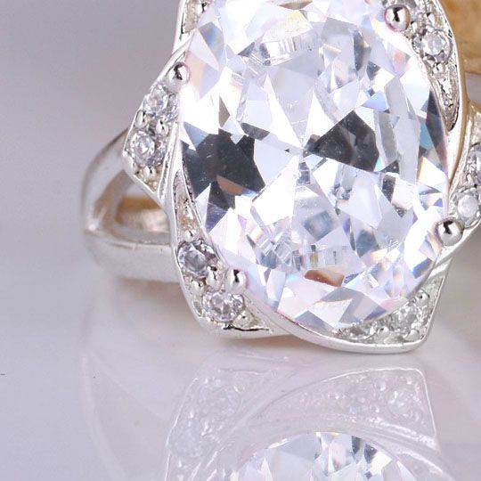 2020 Lady Oval 10X12 Simulated Diamond Nal Genuine .925