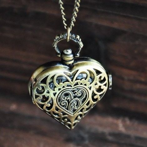 Bronze Antique Squelette Montres de poche Vintage Steampunk Coeur pendentif en argent Colliers Montres quartz femmes cadeau de Noël hommes