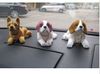 4ピース/ロット卸売ラブリーシェイクヘッド犬の子犬の家具の記事車のエンブレムカーアクセサリー