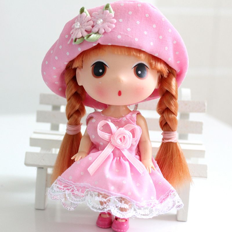 little girl with a doll
