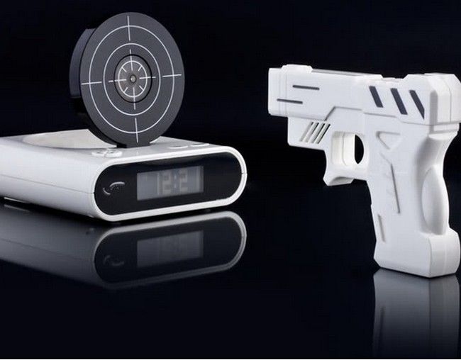 Novelty LCD Laser Gun Shooting Target Wake UP Alarm Desk Clock Gadget