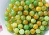 Polychromatic jade beads, about 10 mm in diameter (a pack of 40)