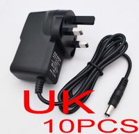 10PCS UK plug AC 100-240V Converter Adapter DC 12V 1A / 9V 1A / 5V 2A / 12V 500mA Power Supply ( 50PCS 100PCS free Express shipping )