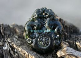 Handmade, double-sided carving, natural dark green jade brave (blessing). Necklace pendant 40x34x9 m