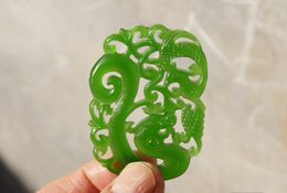 Hand-carved, Malay green jade (double-sided) perforated carving (dragon fly fengdance). Necklace pendant