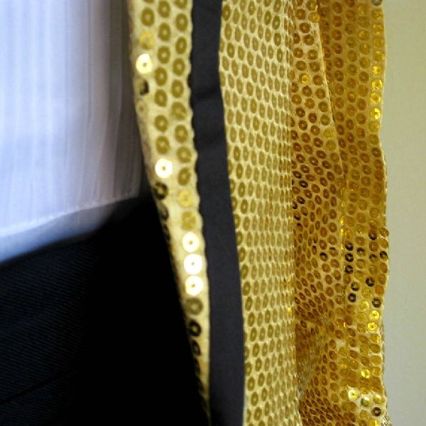 yellow sequin suit