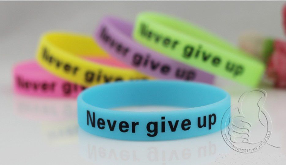 Men Ladies NEVER GIVE UP Luminated Silicone WristBand Sports Daily Wear
