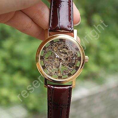  2015 new winner luxury casual female leather business skeleton mechanical women hand wind military wrist watch gift clock