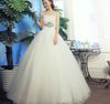 Strapless Wedding Dress Empire Waist Beaded Bodice Ruched Ball Gown Floor Length Tulle Ball Gown Wedding Dresses