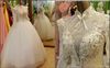 2019 New Luxury Crystals Wedding Dresses High Neck Appliques Beads Long Sleeve Sheer Back A Line Lace Tulle Customed White Bridal Gowns