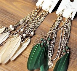 g416-25 European and American feather dress with rhinestone earrings feather earrings wholesale jewelry retro embarrassing Thailand