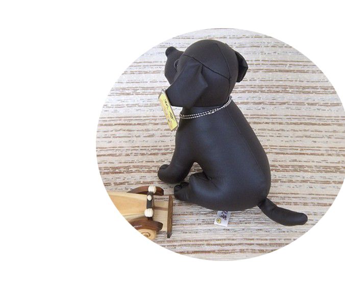 black stuffed dog toy