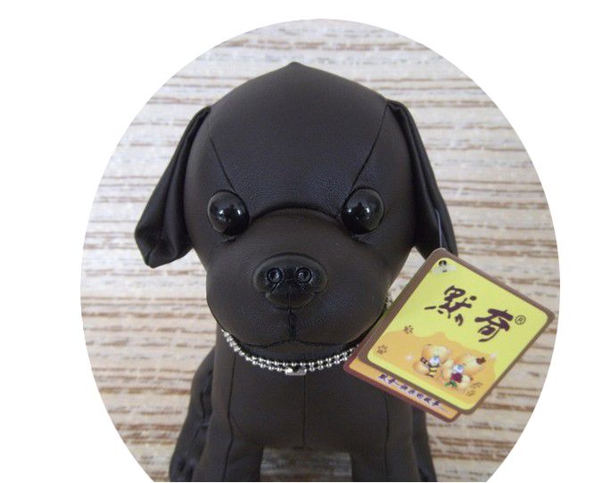 black stuffed dog toy