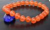 Perles de charme pierres précieuses forme ronde 8mm de couleur orange Jade Stretch Bracelet Les bijoux de la fille de la mode Madame Nouvelle Expédition gratuite.