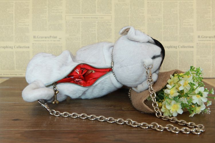 soft toy dog in handbag