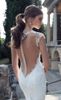 Sheer Wedding Dresses Garden Sheer Lace Täckt Knapp Kortärmad Sjöfrö Bröllop Klänningar Klänning Sexig Mermaid