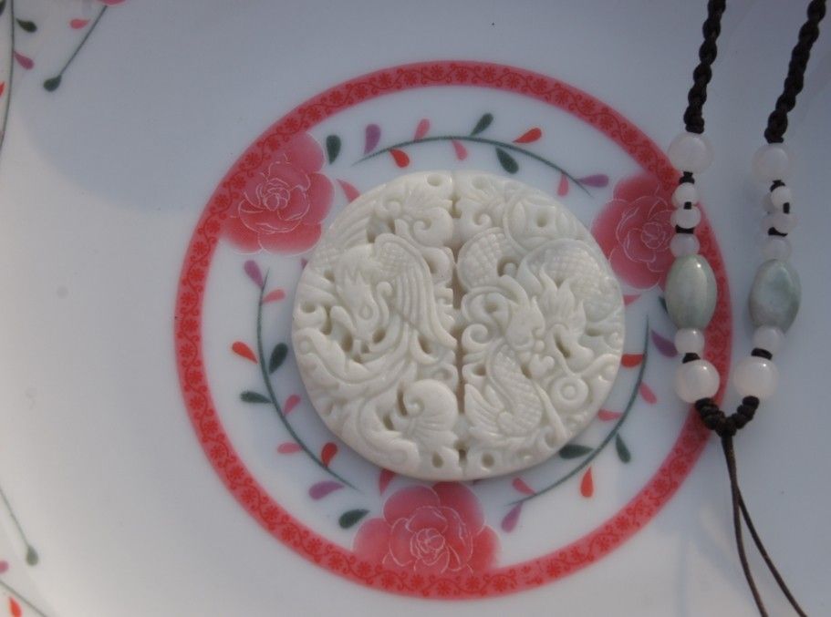 Natural white jade . Hand-carved pendant ( Dragon and Phoenix ) . Pendant necklace , 44x7mm